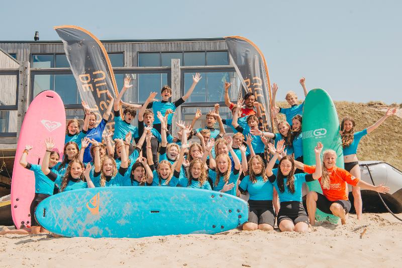 Groepsfoto op watersportvakantie